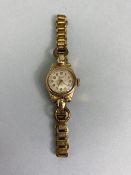 9ct Gold Art Deco styled Rotary watch on a rolled gold bracelet