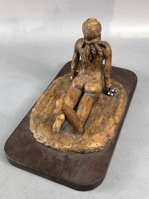 Carved wooden sculpture of a naked woman on a beach signed ADAM'S 08, and inscribed "Sea, Sex & - Image 6 of 8