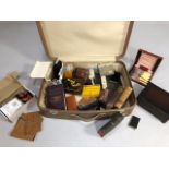 Collection of antique and vintage items contained in a suit case. The proceeds from this lot to be