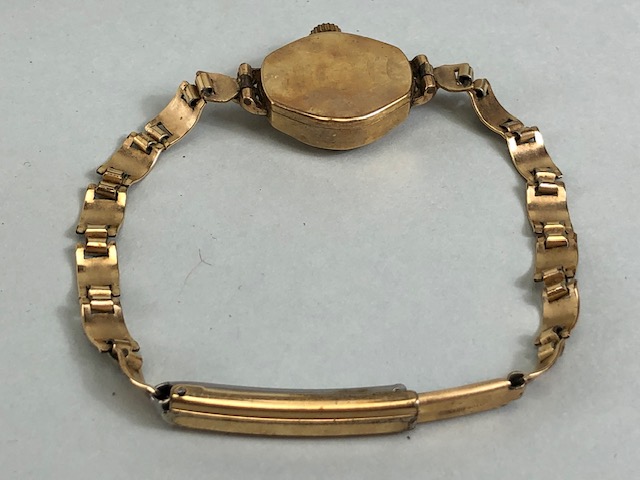 9ct Gold wristwatch by Rotary with Black face and Gold numerals and batons with rolled gold strap - Image 6 of 7