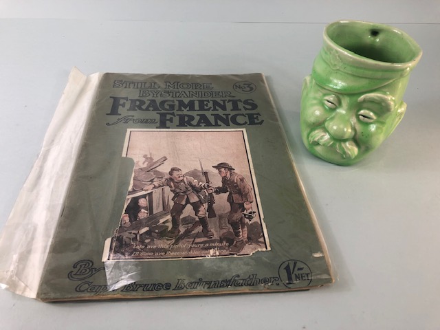 Military interest, WW1 Bruce Bairnsfather, Old Bill character Mug in green glaze along with a copy