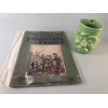 Military interest, WW1 Bruce Bairnsfather, Old Bill character Mug in green glaze along with a copy