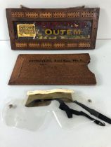 Advertising interest , early 20th century cribbage board with glass advertising panel for OUTEM corn