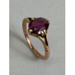 Unmarked Rose Gold Art Deco style ring set with a single faceted Oval stone size approx 'I'