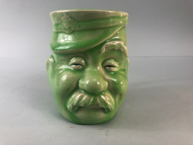 Military interest, WW1 Bruce Bairnsfather, Old Bill character Mug in green glaze along with a copy - Image 2 of 11