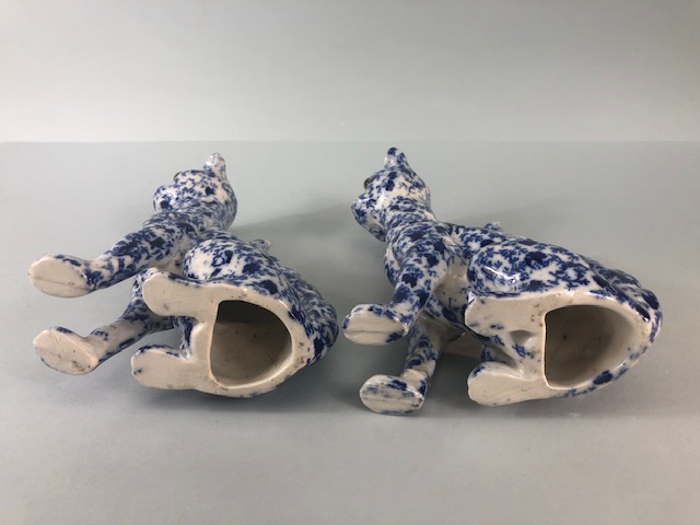 Oriental China, a pair of Chinese long neck cats with cobalt decoration of leaves and tendrils the - Image 5 of 5