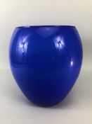 Art Glass, 20th century blue studio glass vase lined with white glass approximately 26cm high