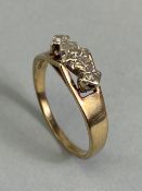 9ct Gold ring size 'R' set with three diamonds and hallmarked for 9ct Gold total weight approx 2.7g