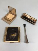 9ct gold mounted cigarette holder, 925 silver cigarette holder and 2 vintage powder compacts one