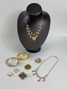 Collection of costume jewellery to include Scottish brooch, Silver and gold coloured bangles, enamel