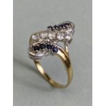 9ct yellow and white gold Ring with twisted design and set with gemstones size approx 'P'
