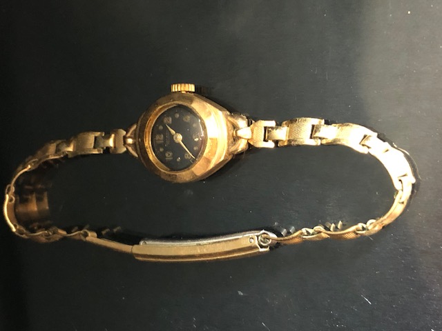 9ct Gold wristwatch by Rotary with Black face and Gold numerals and batons with rolled gold strap