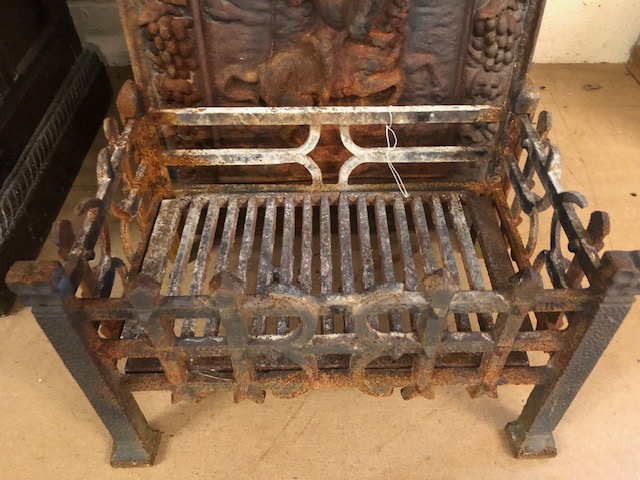 Cast Iron fire back and grate basket, the fire back with lions mask and ribbon decoration and - Image 2 of 5