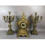 Antique Clock, Louis style elaborately decorated brass cased mantel clock with Roman numeral dial,