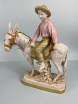 Royal Dux, large 20th century figure of a peasant boy riding a donkey, trade marked to base,