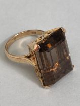 9ct gold ring set with a single baguette cut smoky quartz stone approximately 7.25g total size j