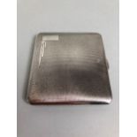 Silver hall marked ladies cigarette case with gilded interior Art deco design, approximately 84.19g