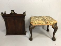 Vintage furniture, a small dark oak wall cupboard with added metal mounts and a foot stool with faux