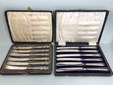 Two Boxed sets of Hallmarked silver handled butter knives