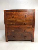 Modern chest of drawers in dark grained wood, run of 4 drawers with geometric wooden draw pulls