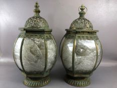 Pair of large decorative metal and glass lanterns, each approx 52cm in height