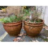 Pair of circular terracotta pots, approx 34cm tall
