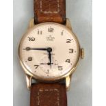 Smiths Deluxe Gold watch, a 9ct gold manual wind gentleman's wristwatch, 15 jewels sets winds and