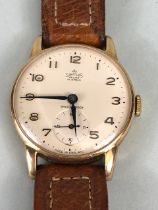 Smiths Deluxe Gold watch, a 9ct gold manual wind gentleman's wristwatch, 15 jewels sets winds and