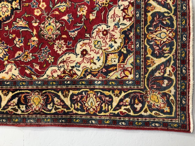 Oriental Rug, Wool rug of Persian design predominantly red background with typical arabesque - Image 3 of 6