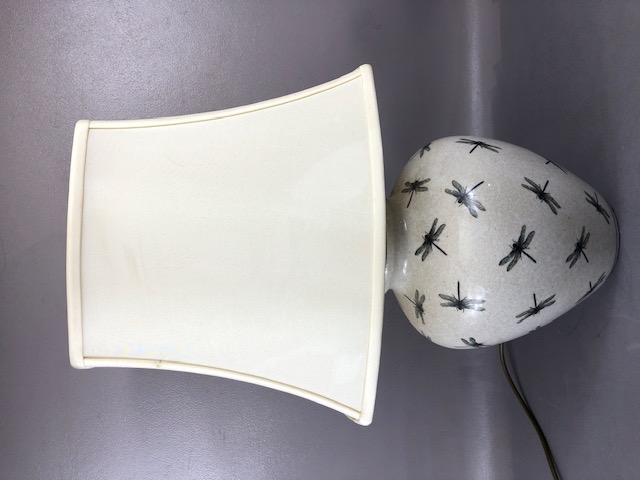 Modern table or side lamp, by India Jane the base of oatmeal crackle glaze with dragon fly design in