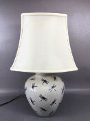 Modern table or side lamp, by India Jane the base of oatmeal crackle glaze with dragon fly design in