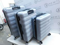 1 AMERICAN TOURISTER 3 PIECE HARDSIDE SUITCASE SET RRP Â£199 (LARGE CASE DENTED AND WHEEL BROKEN)