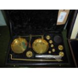 Boxed set of metal letter scales and weights, weighing to 20gms.
