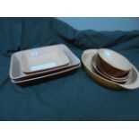7 brown stoneware dishes