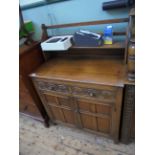 Mid 20th century oak sideboard with upper display gallery,