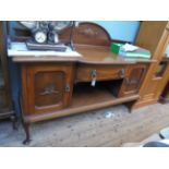 Late 19th century oak sideboard with carved overmantle,