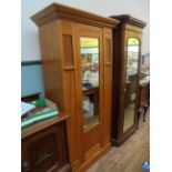 Satinwood single wardrobe, the tongue and grooved interior fitted hanging rails,