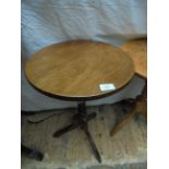 Circular oak drinks table on tricorn base