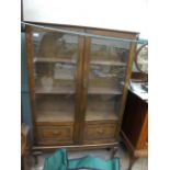 Oak early 20th century bookcase with 2 glazed panels to front and 2 display shelve behind (38" x 8