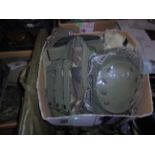 Large box of camouflage clothing including, belts, knee pads,