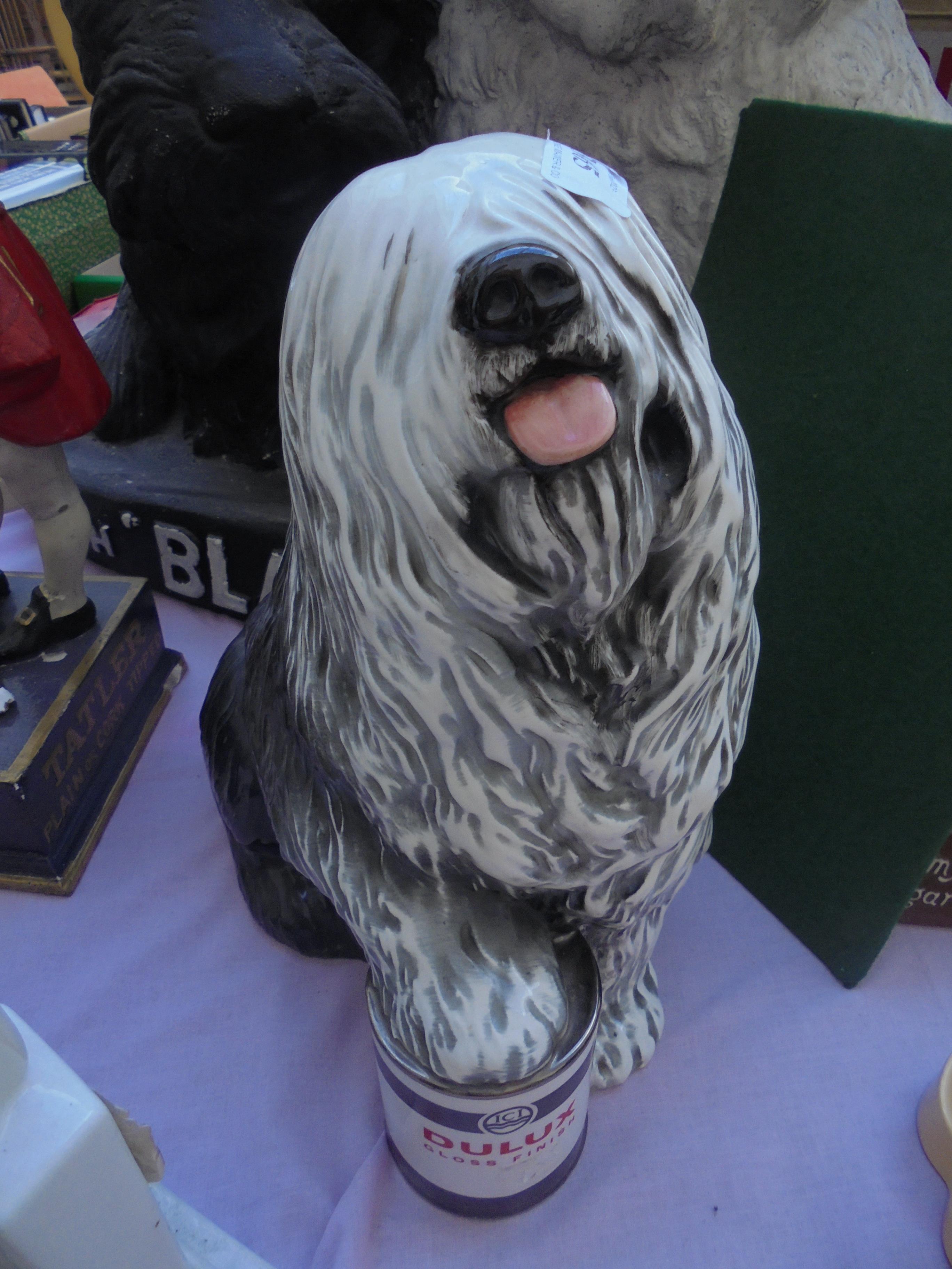 Superb ceramic Olds English Sheepdog for Dulux with paw on tin of paint