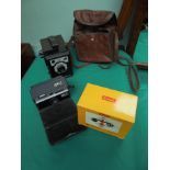 3 vintage cameras,