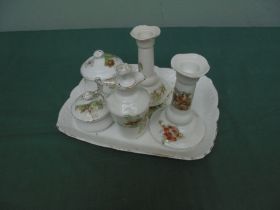 Small ceramic dressing table set with candle holders,