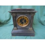 Victorian slate mantel clock with brass face,