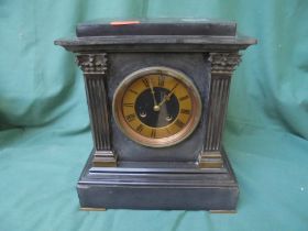 Victorian slate mantel clock with brass face,