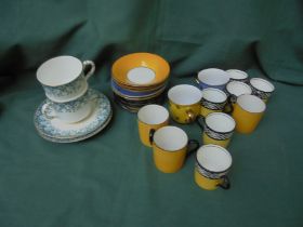 Small selection of tiny coffee cups and saucers,