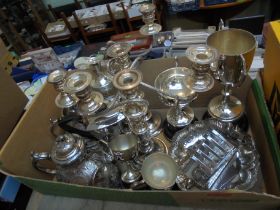 Large box of silver plated items to include candlelabras, tea and coffee pots, claret jug,