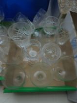 Small box of mixed cut glass wine glasses