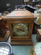 Large wooden mantel clock, brass face,