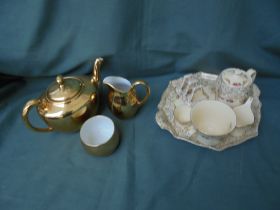Petite Royal Winton tea set comprising tray, teapot, sugar, cream and 1 cup plus gold lustre teapot,